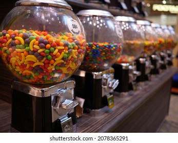 KANSAS CITY, UNITED STATES - Oct 11, 2021: A Closeup Shallow Focus Shot Of Gumball Candy Machines In A Row At Oak Park Mall In Kansas City, US