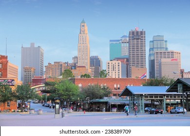 KANSAS CITY, USA - JUNE 25, 2013: People Walk In Downtown Kansas City, Missouri. Kansas City Is The 30th Largest Metropolitan Area In The USA With Population Of 2,393,623.