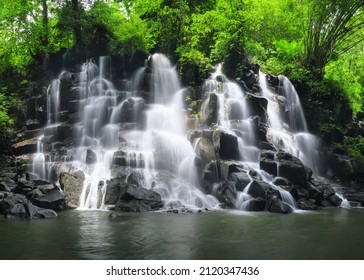 Kanto Lampo Waterfall In Jungle Ubud, Bali Island Indonesia. Tropical Landscape. Wallpaper Background. Natural Scenery.