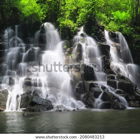 Kanto Lampo Waterfall in jungle Ubud, Bali island Indonesia. Wallpaper background. Natural scenery.