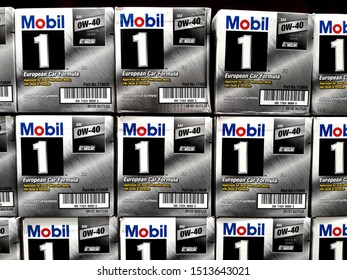 Kaohsiung, Taiwan, August 8, 2019: Mobil 1 0W-40 High-performance Automotive Lubricants 1 Quart 6 Barrels (many Boxes) On The Shelves Of The Store.