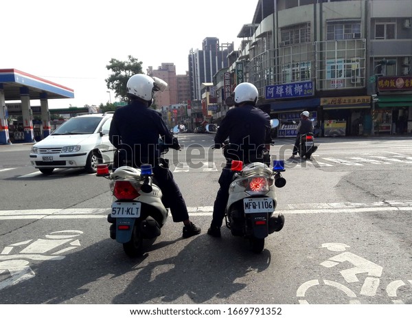 Kaohsiung, Taiwan, February 6, 2020: Taiwan\
police patrol the streets on\
motorcycles.