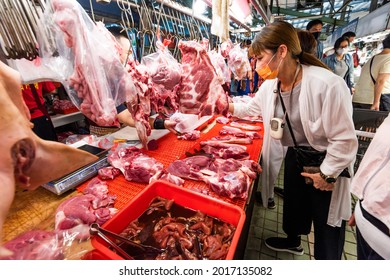 Kaohsiung, Taiwan - May 12, 2021: A stall selling pork at the traditional market in Kaohsiung, Taiwan. This is a large traditional market in North Kaohsiung, Taiwan.
