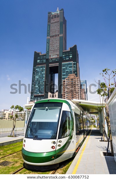 Kaohsiung, Taiwan :\
View of light rail train and the skyline in Kaohsiung, Taiwan on\
April 03, 2017. The light rail system in Kaohsiung is the first\
light rail transit in\
Taiwan.