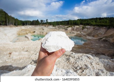 Kaolin Clay White Specimen Mineral In Mans Hand