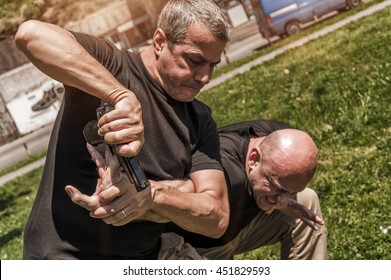 Kapap Instructor Demonstrates Self Defense Techniques Against A Gun