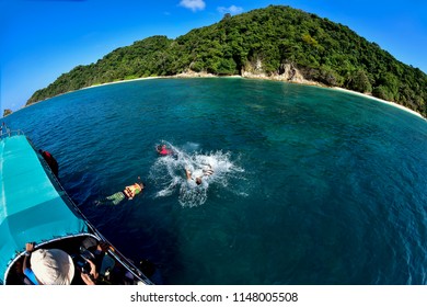 Kapas Island, Terengganu, Malaysia. 
01 April 2016 :
Unidentified Group Of Tourist Enjoying The Moment , Snorkeling, Diving   At Kapas Island, Malaysia. Shot By Fish Eye Lens.