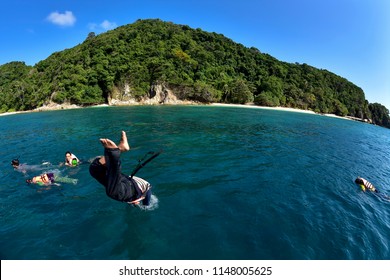 Kapas Island, Terengganu, Malaysia. 
01 April 2016 :
Unidentified Group Of Tourist Enjoying The Moment , Snorkeling, Diving   At Kapas Island, Malaysia. Shot By Fish Eye Lens.