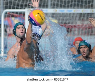 KAPOSVAR, HUNGARY - OCTOBER 1: Unidentified players in action at a Hungarian national championship water-polo game between Kaposvar (white) and Honved (green) on October 1, 2011 in Kaposvar, Hungary