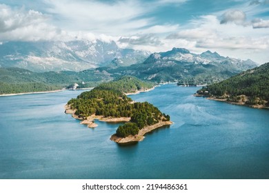 Karacaoren Lake And Mountains Aerial View Landscape In Turkey. Forest Island In Turquoise Water Scenery Wild Nature Travel Beautiful Destinations