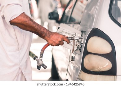 Karachi Pakistan 2020, CNG Gas Nozzle Filling Gas In A Car, Fuel Prices, Gas Stations In Pakistan. 