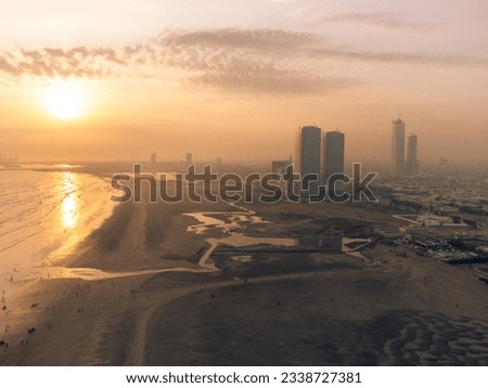 karachi pakistan 2022, cityscape and landmarks of karachi city, aerial picture of bahria icon tower, dolmen mall clifton, harbor front. Sunrise at karachi, sea view, Business hub of Pakistan at susnet