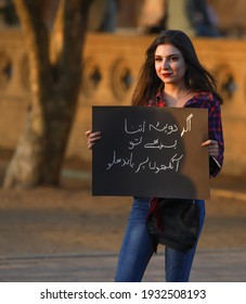 Karachi Pakistan 8th March 2021, Aurat March At Frere Hall Karachi On International Women's Day, Play Cards In Hand