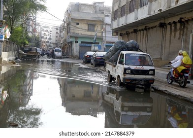 KARACHI, PAKISTAN - APR 20: Inundated Road By Overflowing Sewerage Water Due To 
Poor Sewerage System, Creating Problems For Commuters, Showing Negligence Of Authorities, On April 20, 2022 In Karachi.