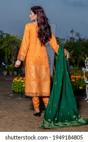 Karachi, Pakistan - April 02, 2021: Beautiful Pakistani Women In Traditional Embroidery Shalwar Kameez Dress. Fashion Concept