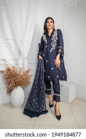 Karachi, Pakistan - April 02, 2021: Beautiful Pakistani Women In Traditional Embroidery Shalwar Kameez Dress. Fashion Concept