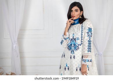 Karachi, Pakistan - April 02, 2021: Beautiful Pakistani Women In Traditional Embroidery Shalwar Kameez Dress. Fashion Concept