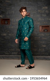 Karachi, Pakistan - April 10, 2021: Young Pakistani Men Wearing Shalwar Kameez (kurta). Fashion Concept