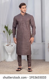 Karachi, Pakistan - April 10, 2021: Young Pakistani Men Wearing Shalwar Kameez (kurta). Fashion Concept