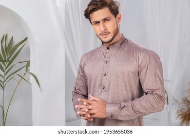 Karachi, Pakistan - April 10, 2021: Young Pakistani Men Wearing Shalwar Kameez (kurta). Fashion Concept