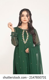 Karachi, Pakistan - April 10, 2022: Beautiful Pakistani Women In Traditional Embroidery Shalwar Kameez Dress. Fashion Concept