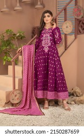 Karachi, Pakistan - April 10, 2022: Beautiful Pakistani Women In Traditional Embroidery Shalwar Kameez Dress. Fashion Concept