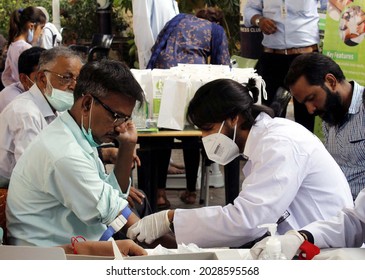 KARACHI, PAKISTAN - AUG 21: Journalists Are Being Examining By Doctors During Free 
Medical Camp Facility Organized By Advanced Lab Laboratory Held At Press Club On August 21, 2021 In Karachi.