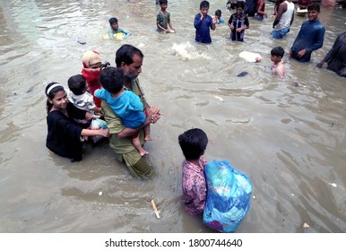KARACHI, PAKISTAN - AUG 22: Residents are facing difficulties due to flooded area caused by heavy downpour of monsoon season due to poor sewerage system, on August 22, 2020 in Karachi.

