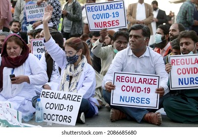 KARACHI, PAKISTAN - DEC 06: Members Of Young Nurses Association Are Holding Protest Demonstration For Regularize Covid-19 Doctors And Nurses Nearby CM House On December 06, 2021 In Karachi.