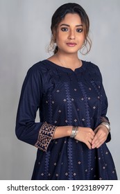 Karachi, Pakistan - February 10, 2021:Beautiful Trendy Woman In Designer Kurti Dress. Posing In Studio. Fashion Concept.