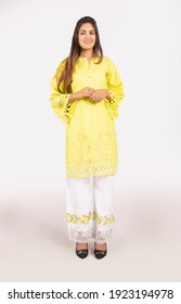 Karachi, Pakistan - February 10, 2021:Beautiful Trendy Woman In Designer Kurti Dress. Posing In Studio. Fashion Concept.