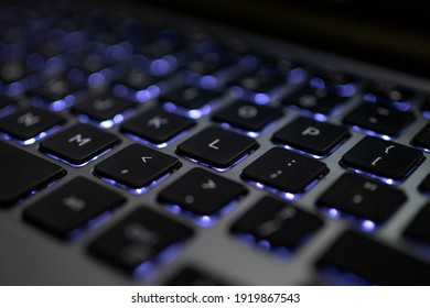 Karachi, Pakistan - February 15, 2021: image of a backlit keyboard. Selective Focus