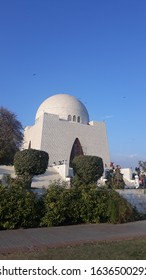 Karachi, Pakistan – January 25, 2020: The Beautiful And Ionic Tomb Of The Quaid‐e‐Azam. Also There Is Blue Sky And Small Trees In This Picture. 