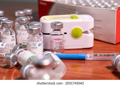 Karachi, Pakistan - July 10, 2021: Sinopharm COVID-19 vaccine bottle dose , Sars-Cov-2 Vaccine inactivated Vero cell, Sino pharm is a Chinese state-owned company, Selective focus