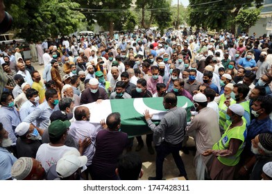 KARACHI, PAKISTAN - JUN 02: Relatives And Residents Attend Funeral Prayer Of Plane Crash Incident Victims Danish And His Family Members Who Were Martyrdom PIA Airplane Crash On June 2, 2020 Of Karachi