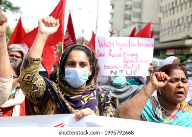 KARACHI, PAKISTAN - JUN 23: Members Of Home Based Women Workers Federation Are Holding Protest Demonstration Against Prime Minister Controversial Statement On Women Dressing On June 23 2021 In Karachi