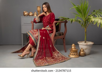 Karachi, Pakistan - March 07, 2022: Beautiful Pakistani Women In Traditional Embroidery Shalwar Kameez Dress. Fashion Concept