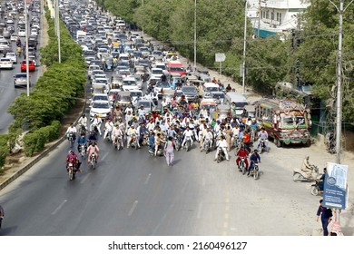 KARACHI, PAKISTAN - MAY 25: Supporters of PTI block road as they are holding protest demonstration (Azadi Long March) against federal government to dissolve assemblies on May 25, 2022 in Karachi.