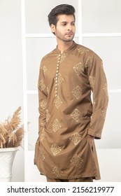 Karachi, Pakistan - Mmay 14, 2022: Pakistani Man In Traditional Wear  Kurta Pyjama Cloths. Male Fashion Model In Sherwani, Posing In Studio, Wedding Fashion Concept