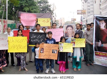 KARACHI, PAKISTAN - NOV 13: Relatives Of Victims Who Were Lost Their Lifes In Air Blue Plane Crash Are Protesting In Favor Of Their Demands During A Demonstration On November 13, 2010 In Karachi.