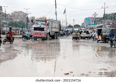 KARACHI, PAKISTAN - OCT 02: Commuters Are Facing Difficulties Due To Stagnant Sewerage Water Due To Poor Sewerage System Showing Negligence Of Concerned Authorities, On October 02, 2021 In Karachi.