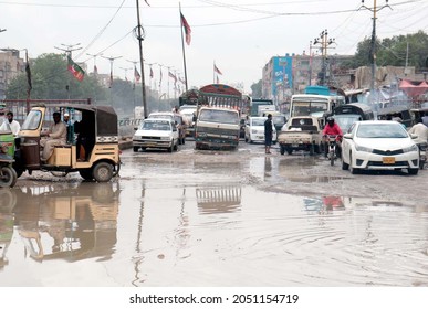 KARACHI, PAKISTAN - OCT 02: Commuters Are Facing Difficulties Due To Stagnant Sewerage Water Due To Poor Sewerage System Showing Negligence Of Concerned Authorities, On October 02, 2021 In Karachi.