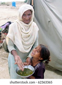 171 Pakistan Flood Women Images, Stock Photos & Vectors | Shutterstock