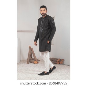 Karachi, Pakistan - October 29, 2021: Young Pakistani Men Wearing Shalwar Kameez (kurta). Fashion Concept