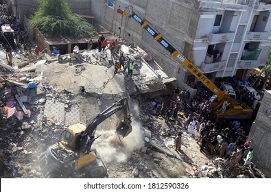 KARACHI, PAKISTAN - SEP 10: Rescue Officials Are Busy In Rescue Operation At The Site Of Multi-storeyed Residential Building Collapse Incident Located On Korangi Area On September 10, 2020 In Karachi.