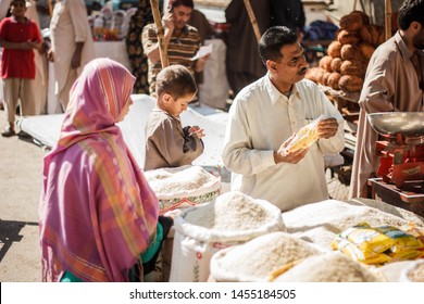 Karachi, Sindh - Pakistan: June 12 2014 - Peoples selling vegetable & grocery stores on a old empress market - Shutterstock ID 1455184505