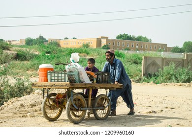 
Karachi,Sindh,Pakistan: 11/09/2018
 A Moving Stall Poor Seller On The Street Of A Village 