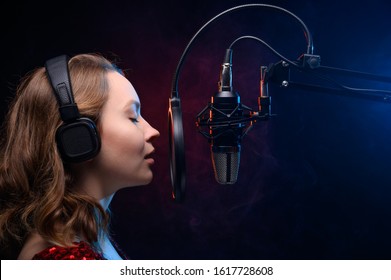 Karaoke, A Female Vocalist Sings Into A Microphone. Vocal And Study Of Singing, More Developed Voice And Training. Banner