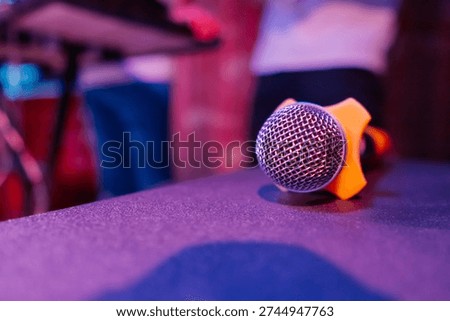 A karaoke microphone is lying on the table