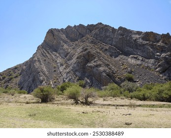 The Karatau Mountains, located in Central Asia, stretch across southern Kazakhstan and parts of Uzbekistan. These mountains are characterized by rugged terrain, steep cliffs, and diverse ecosystems, r - Powered by Shutterstock